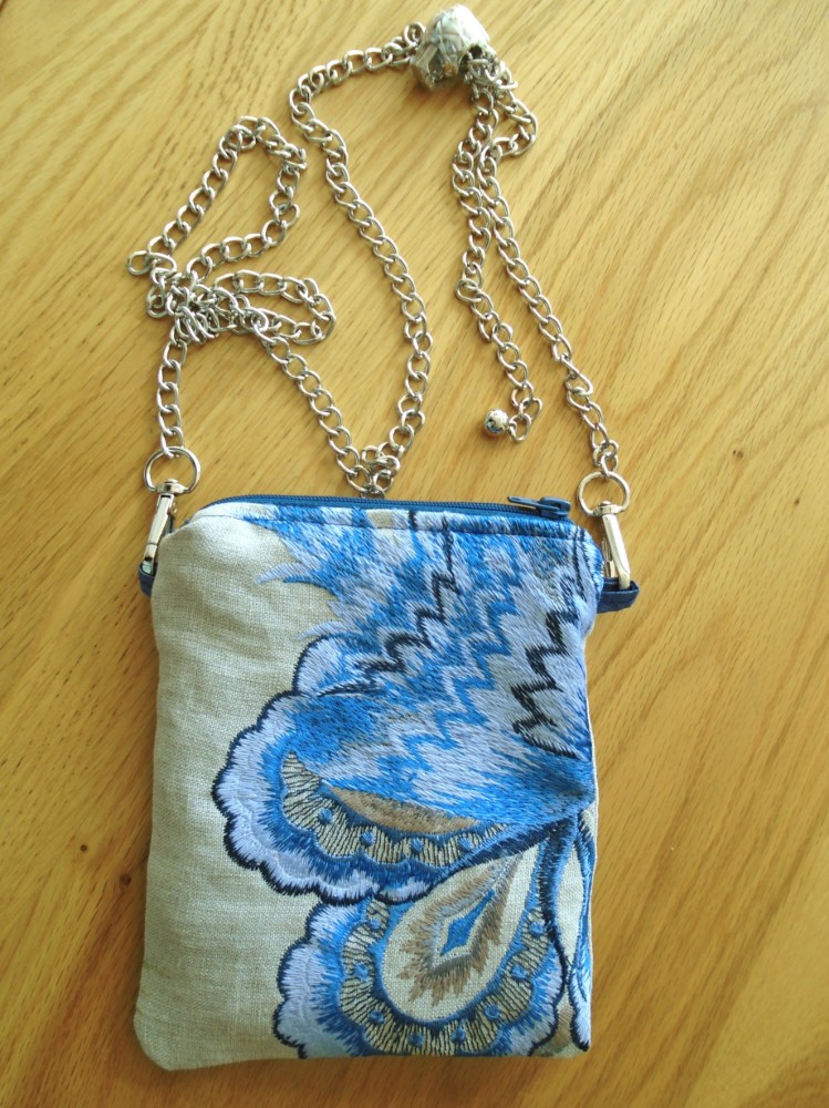 Embroidered blue phone pouch image